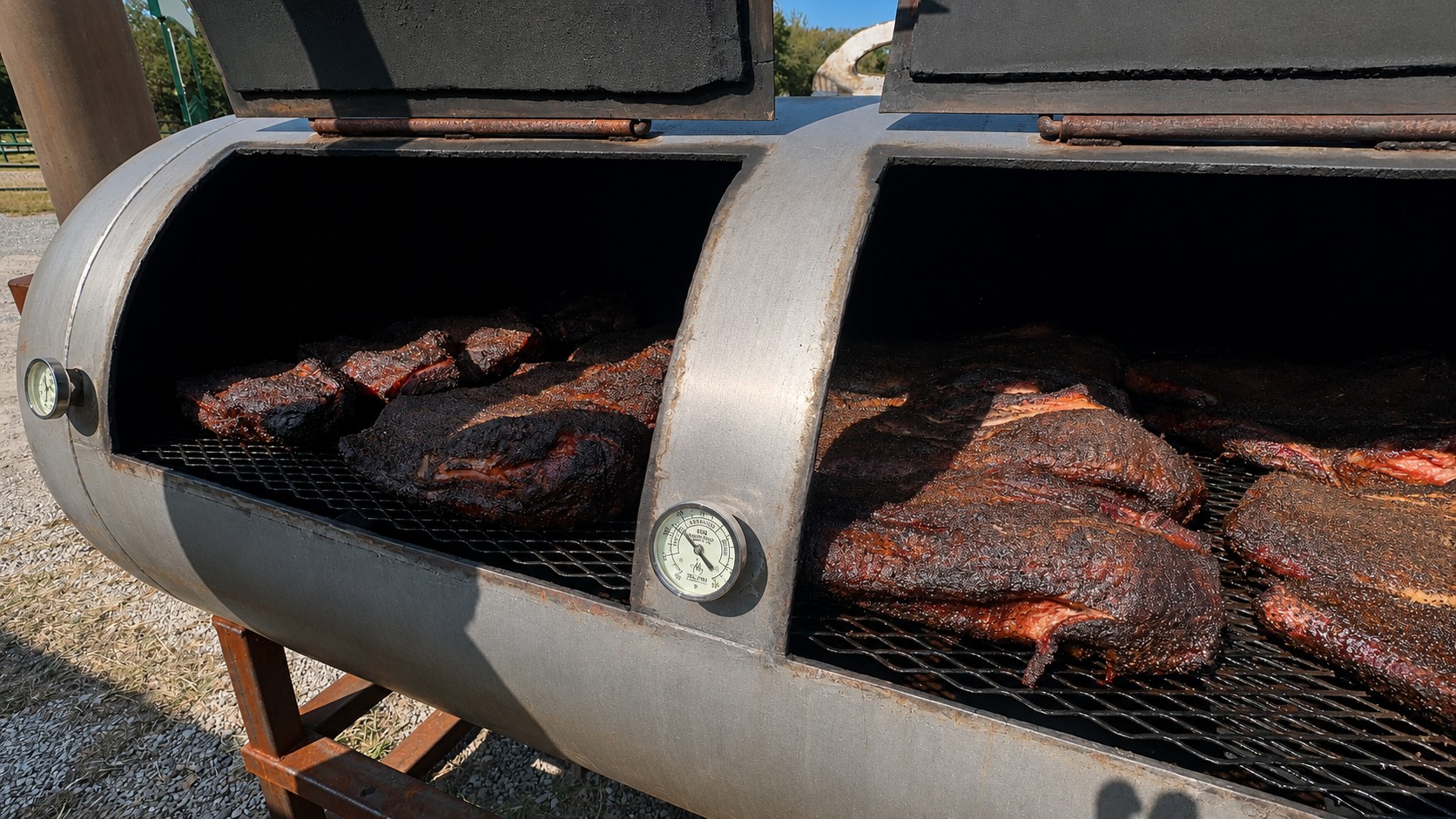 Brisket on the smoker at the fundraiser